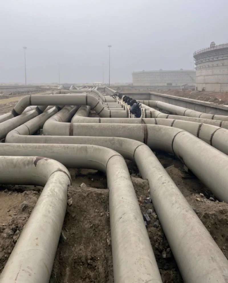 Above-ground pipelines across a Vectras terminal project site